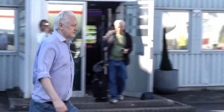 This screen shot courtesy of WikiLeaks X page shows Wikileaks founder Julian Assange walking to board a plane from London Stansted Airport on June 24, 2024. - Julian Assange "is free" and has been released from a high-security London prison where he was held for five years, his Wikileaks organisation said June 24, after reaching a US plea deal.
The 52-year-old Australian was taken Monday, June 24, from Belmarsh prison to London's Stansted airport, a Wikileaks statement said, from where he boarded a flight to an unnamed destination. (Photo by WikiLeaks / AFP) / RESTRICTED TO EDITORIAL USE - MANDATORY CREDIT "AFP PHOTO / HANDOUT / WIKILEAKS " - NO MARKETING - NO ADVERTISING CAMPAIGNS - DISTRIBUTED AS A SERVICE TO CLIENTS